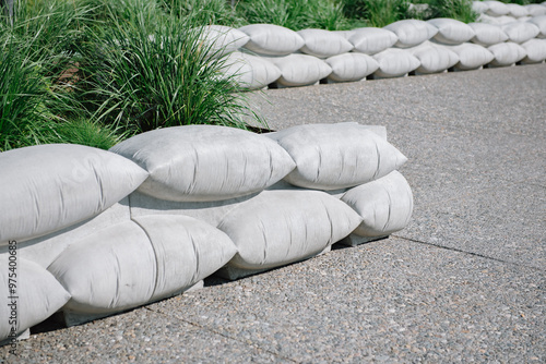 Public seats in the form of sandbags arranged in rows made of cement. photo