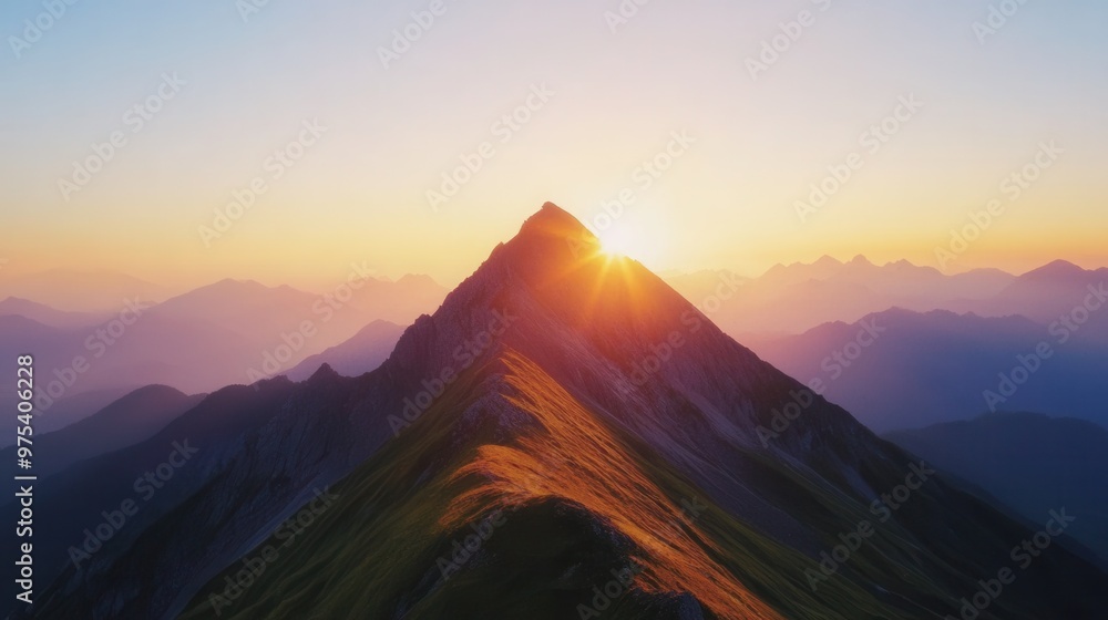Obraz premium A breathtaking view of a mountain range during sunrise with panoramic composition