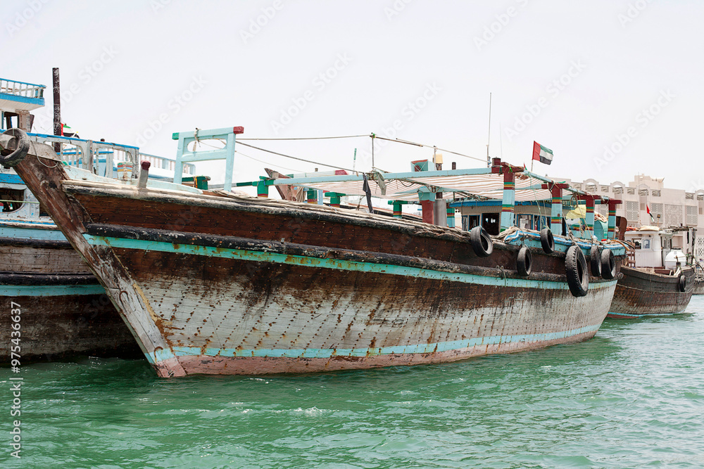 Fototapeta premium Dhows, traditional trading vessels at Dubai Creek, Dubai