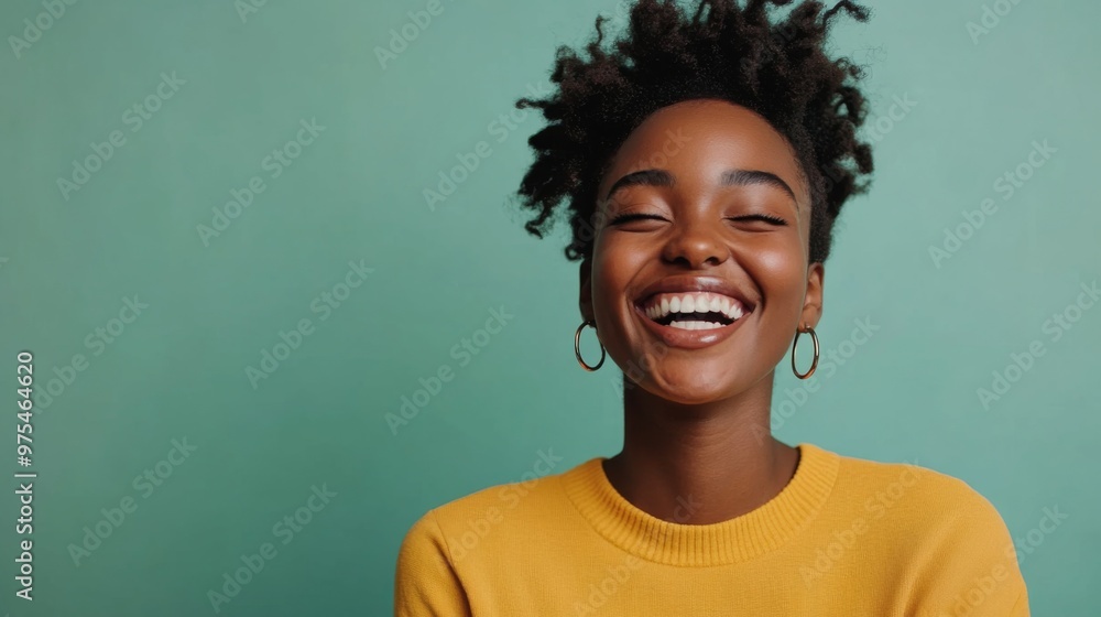 A happy person with a broad smile and joyful expression, standing against a plain color background with copy space A happy person with a broad smile and joyful expression, standing against a plain color background with copy space
