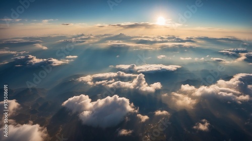 Aerial View of Clouds Floating Above Earth's Surface with a Peaceful Atmosphere.