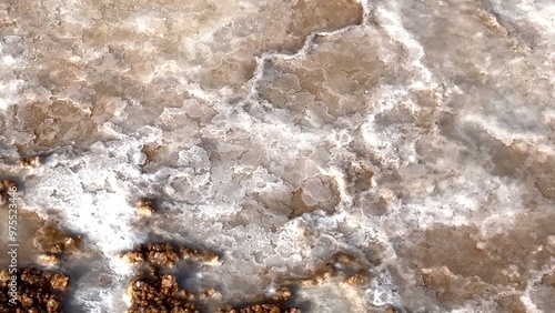 Quadro su tela Formation of Salt Deposits on Shore Natural forces create salt deposits along shoreline, forming unique landscape