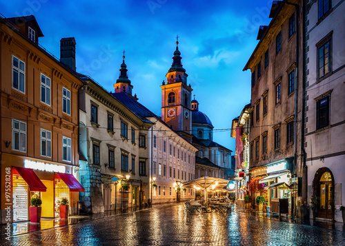 Old Ljubljana cityscape cobbled Ciril-Metodov street evening view. Ljubljana capital of Slovenia.