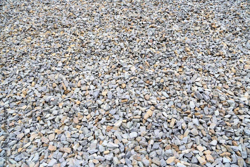 Textures of crushed stones  in a construction site, showcasing natural colors and materials in the heart of the city