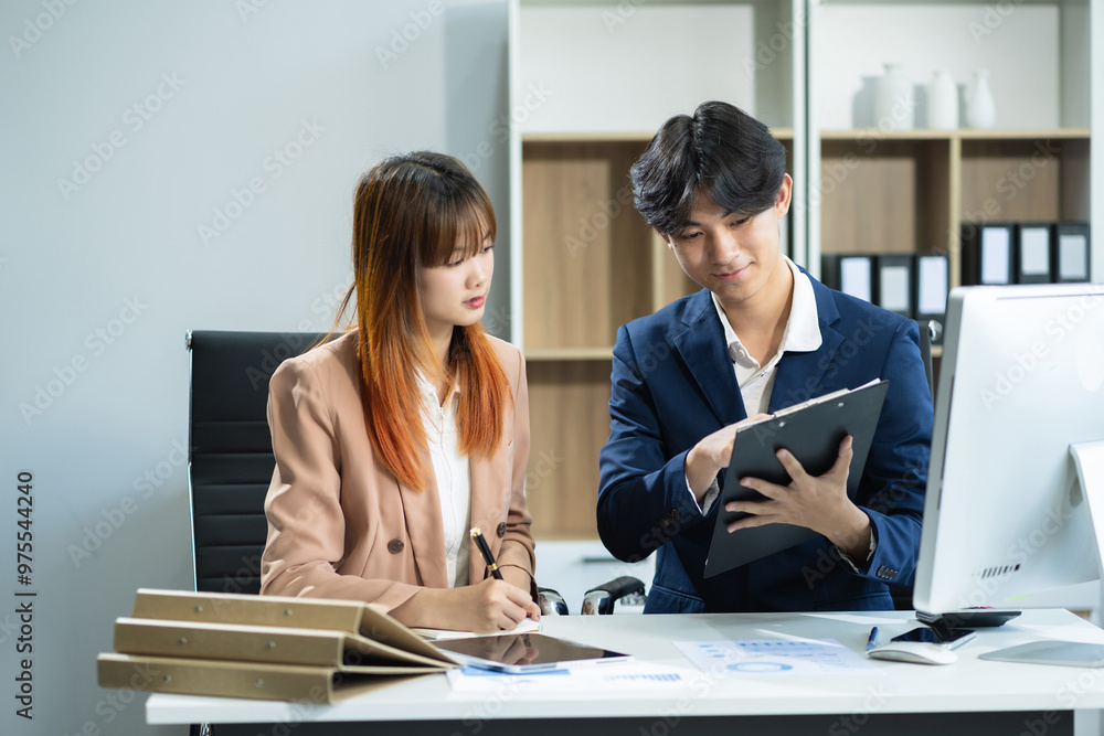 Professional investor working new start up project. Finance managers meeting.using laptop and digital tablet computer in office.