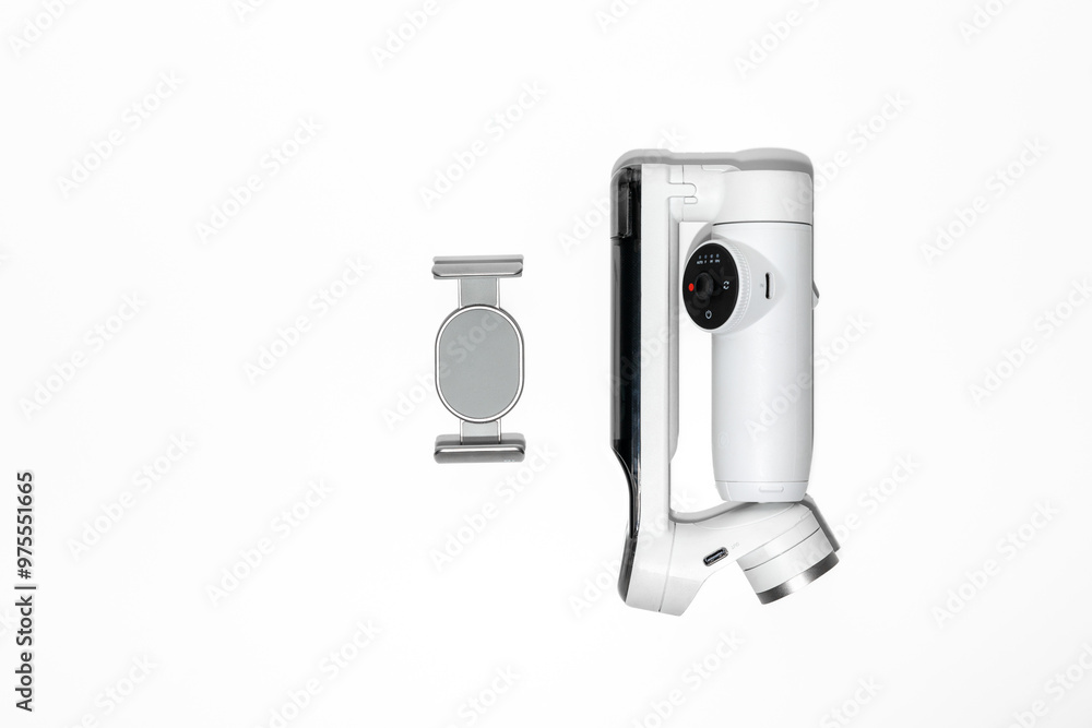 Smartphone gimbal white on an isolated white background with copy space. Smartphone gimbal white on an isolated white background with copy space.