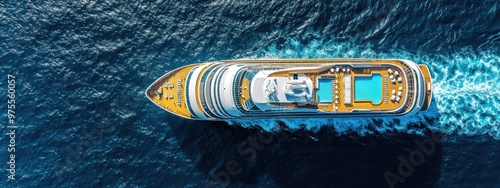 A large cruise ship is sailing through the ocean. The ship is surrounded by water and has a pool on the deck. The water is calm and the sky is clear photo