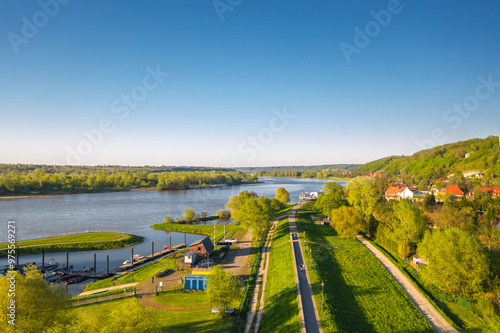 Obraz na płótnie Aerial view of Wisla quay (Bulwar Nadwiślański) in Kazimierz Dolny, Lesser Poland (Małopolska). Evening view at sunset. w salonie