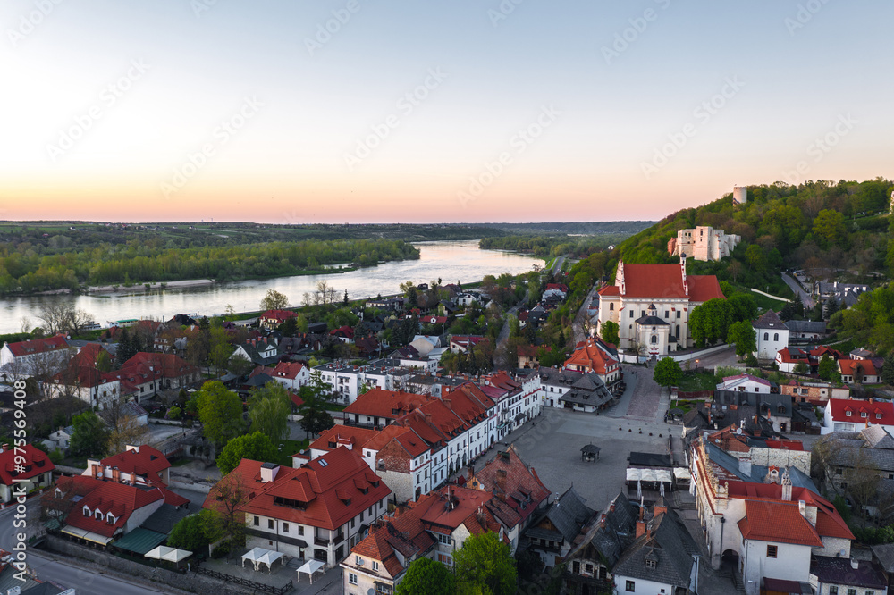 Summer skyline cityscape of Kazimierz Dolny, Lesser Poland (Małopolska). Wide panoramic view of the old town at sunset