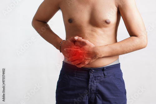 Fitness, stomach ache and man outdoor after running, workout or exercise. Sports, abdominal pain and male athlete in nature with injury, emergency or problem, sick or hernia after training mockup.