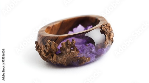 A softlavender wood resin ring, featuring a delicate mix of wood and resin, isolated on a white background photo