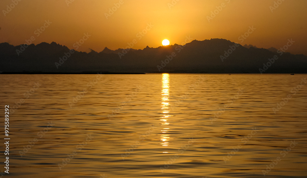 Red sunset over the Red Sea off the coast of Egypt Red sunset over the Red Sea off the coast of Egypt