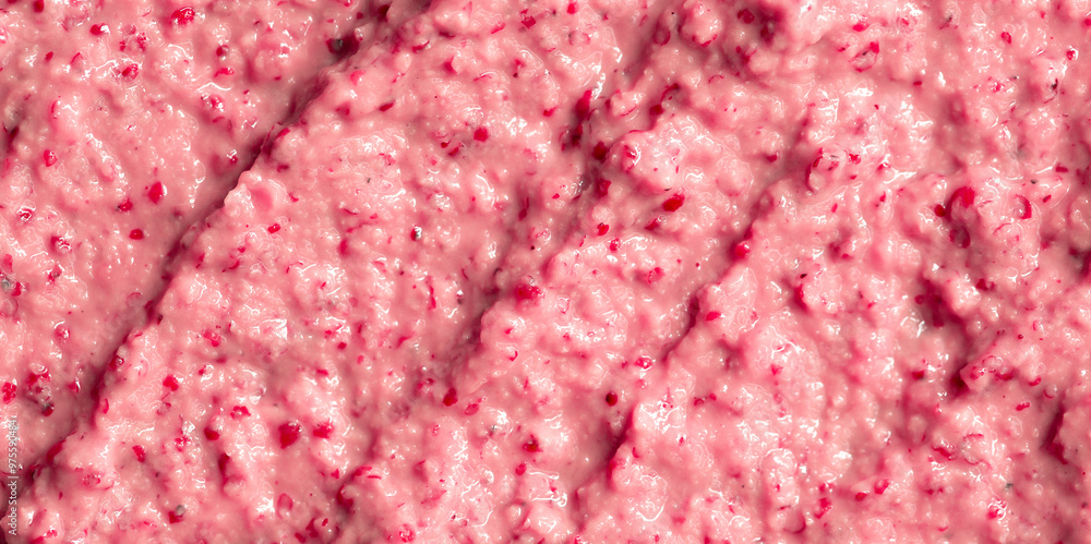 Berry yoghurt ice cream. Smoothies from fresh fruits and berries. Ice cream texture. Delicious sweet dessert close-up as a background. Berry yoghurt ice cream. Smoothies from fresh fruits and berries. Ice cream texture. Delicious sweet dessert close-up as a background.