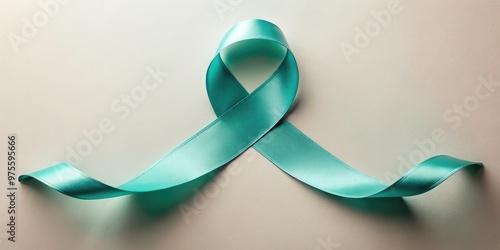 A delicate teardrop-shaped ribbon in a soft, gentle hue, symbolizing ovarian cancer awareness, hope, and support for those affected by this serious women's health issue. photo