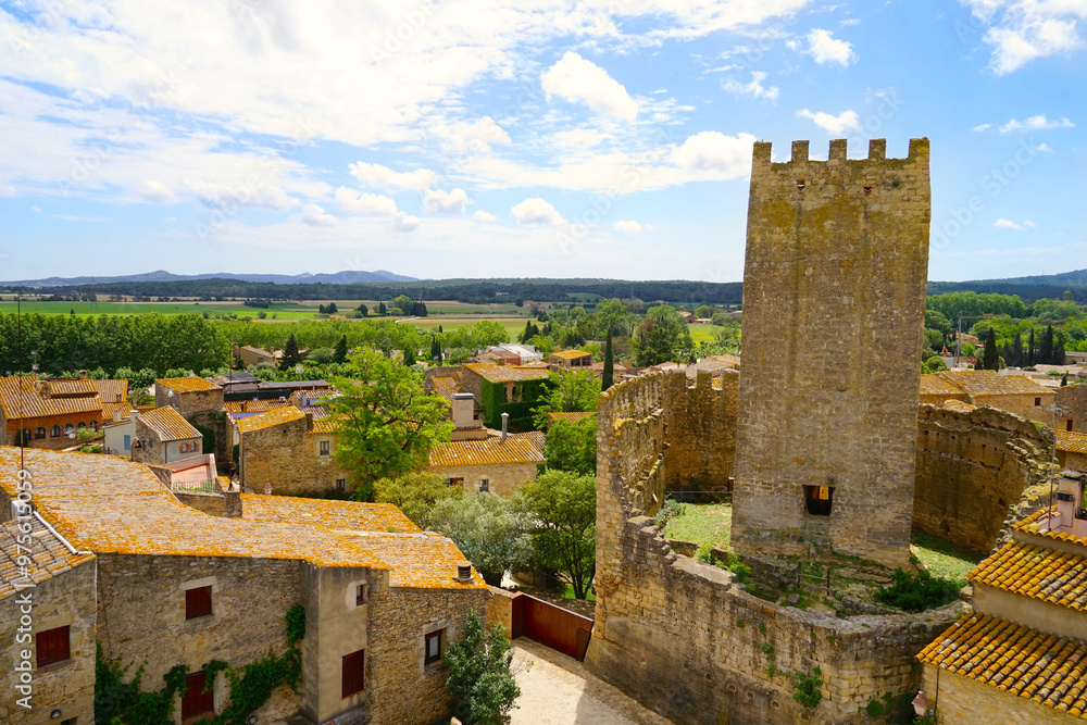 view from the old Torre de les Hores tower in Peratallada over the historic centre with small alleys and medieval Romanesque buildings and the Castle of Peratallada, Pals, Begur, Girona, Catalonia view from the old Torre de les Hores tower in Peratallada over the historic centre with small alleys and medieval Romanesque buildings and the Castle of Peratallada, Pals, Begur, Girona, Catalonia