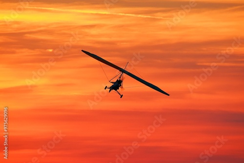 Ultralight Trike Flying Above Clouds at Sunset – Freedom and Adventure Concept