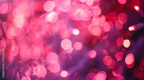 A vibrant blur of pink and purple bokeh lights creating a festive atmosphere.