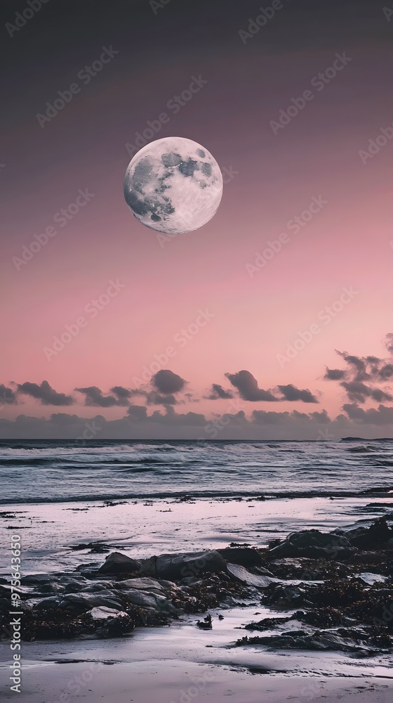 Full moon over a calm ocean at dusk. Full moon over a calm ocean at dusk.