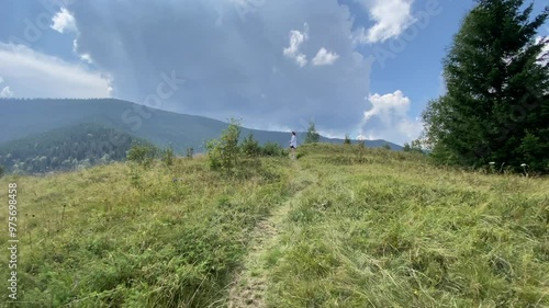 woman walking in the mountains