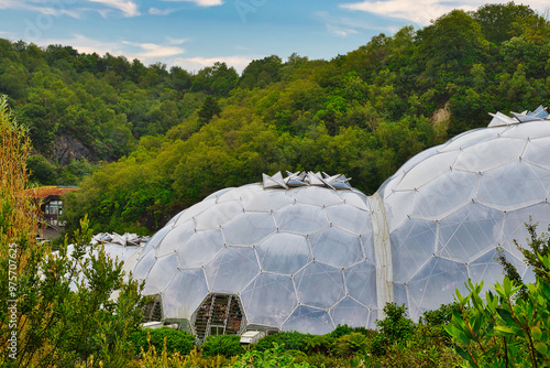 Geodesic Domes Surrounded by Lush Greenery at Eden Project in Cornwall, UK photo