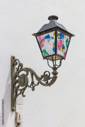 Obraz na płótnie Decorated street light on the facade of a white house in Altea, Spain w salonie