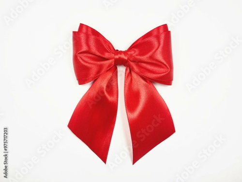 Beautiful lush bow made of red satin ribbon 
