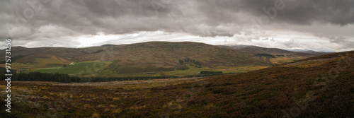 A cloudy, autumnal panorama image of the Upper Strathdon area around Corgarff Castle in the grampian region, Scotland. photo