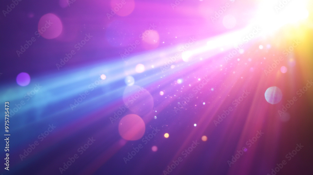 Obraz premium Bright beams of light illuminate a colorful abstract background with soft bokeh effects