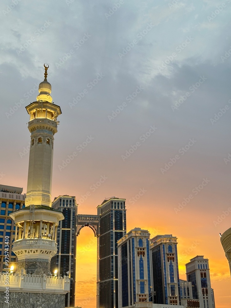 Obraz premium The minaret of the Grand Mosque with the golden crescent. The crescent is covered with gold-plated glass that looks magnificent, the height of the minaret of the Grand Mosque is more than 130 meters,