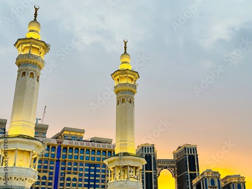 The minaret of the Grand Mosque with the golden crescent. The crescent is covered with gold-plated glass that looks magnificent, the height of the minaret of the Grand Mosque is more than 130 meters,  photo