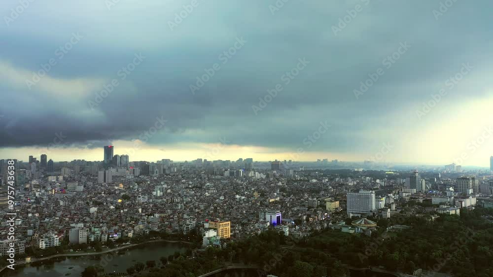 Drone, city and traffic by buildings, skyline or transport with infrastructure, earth or metro buildings. Urban environment, road and landscape for dark clouds on horizon, lake or travel in Vietnam Drone, city and traffic by buildings, skyline or transport with infrastructure, earth or metro buildings. Urban environment, road and landscape for dark clouds on horizon, lake or travel in Vietnam