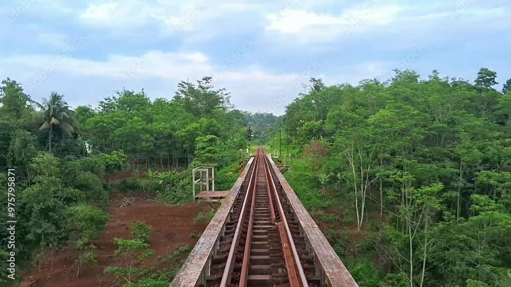 Natural scenery on the train track when crossing the bridge Natural scenery on the train track when crossing the bridge