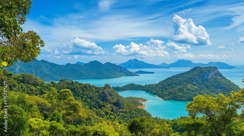 Langkawi Island is beautiful, the sea is beautiful, the sky is clear, the clouds are beautiful, and the trees are green.