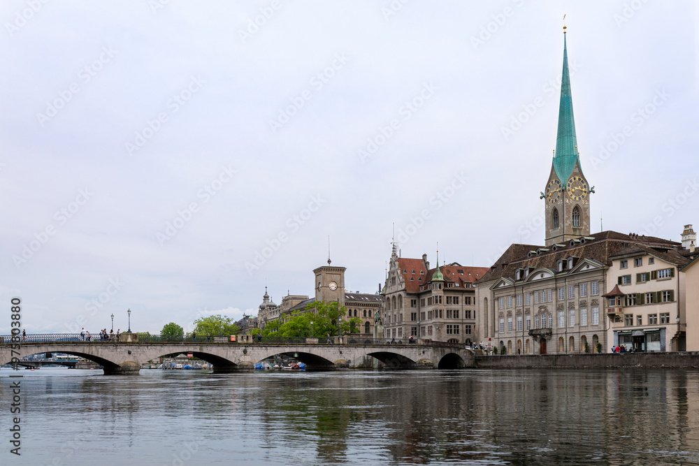 Historic architecture at Limmat riverbank in Zurich at night Historic architecture at Limmat riverbank in Zurich at night