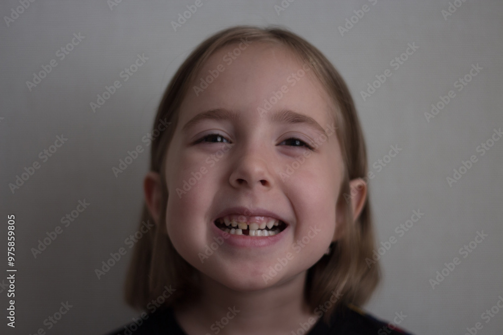 The smile of a child whose tooth has fallen out The smile of a child whose tooth has fallen out
