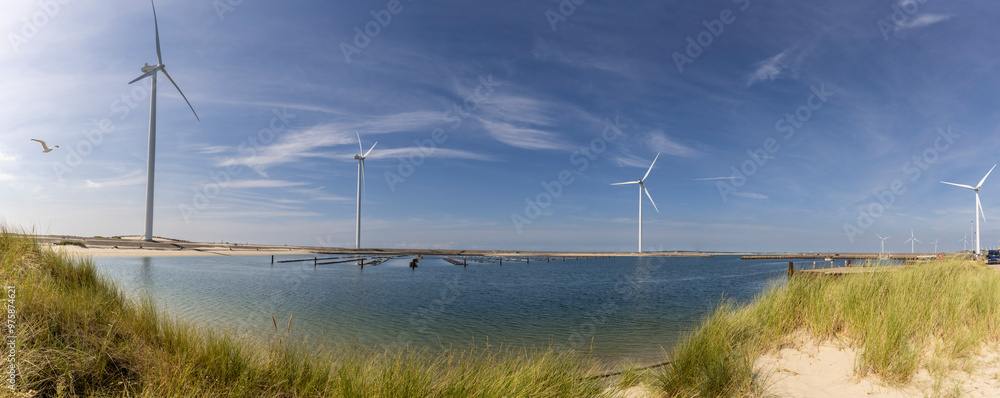Panoramic shot of wind power plants on the coast of Zeenland district in the south of Holland