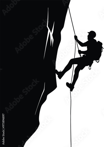 Silhouette of a Climber Scaling a Steep Rock Face