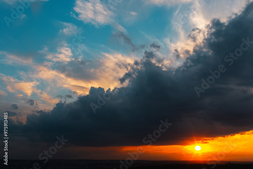 Colourful landscape of beautiful sunset or sunrise with cloudy sky. Natural abstract background.