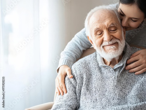 Elderly father smiling warmly as his adult son helps him into a chair, familial love in focus, soft morning light