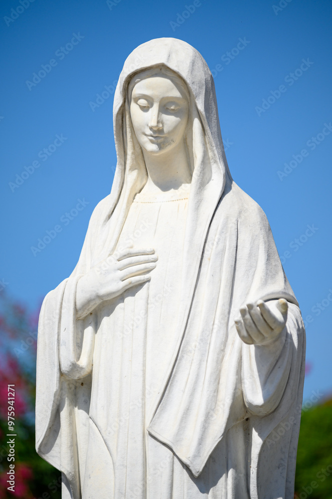 The statue of the Queen of Peace near the St James Church in Medjugorje, Bosnia and Herzegovina. The statue of the Queen of Peace near the St James Church in Medjugorje, Bosnia and Herzegovina.