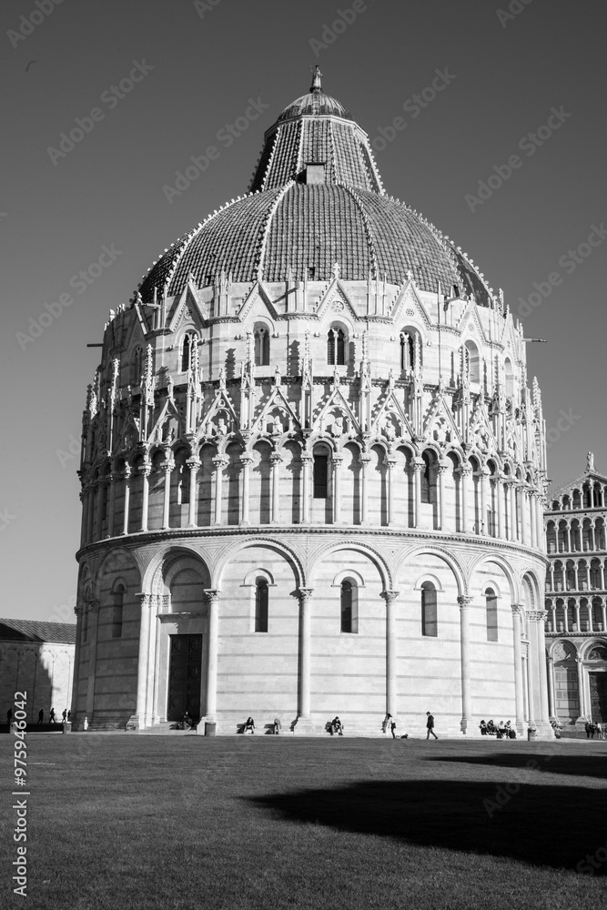 The Pisa Baptistery of St. John is a Roman Catholic ecclesiastical building located in the Piazza dei Miracoli, near the cathedral's and the famous leaning tower. The Pisa Baptistery of St. John is a Roman Catholic ecclesiastical building located in the Piazza dei Miracoli, near the cathedral's and the famous leaning tower.