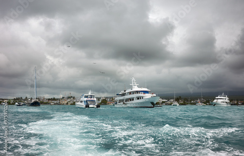 Storm clouds over Puerto Ayora harbor, Santa Cruz Island, Ecuador. photo