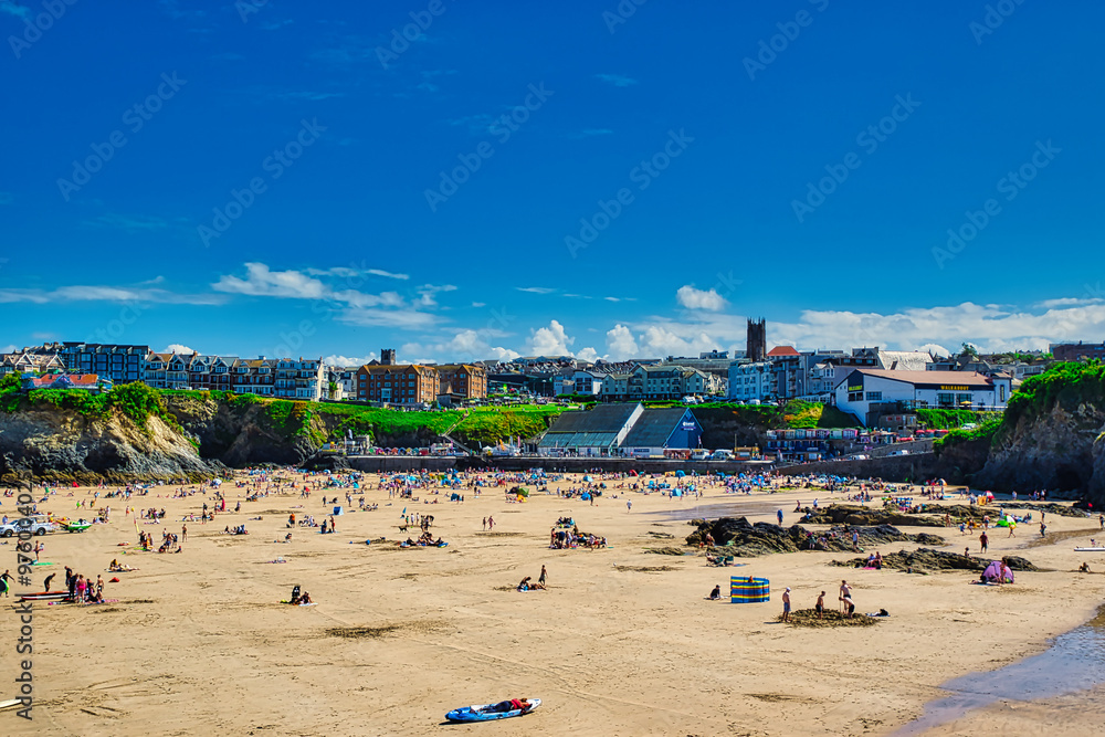 Busy Beach Scene on a Sunny Day at Towan Beach, Newquay, UK Busy Beach Scene on a Sunny Day at Towan Beach, Newquay, UK