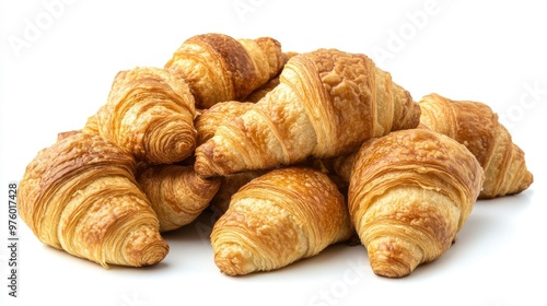 A heap of fresh, golden-brown croissants, perfect for breakfast or a snack.