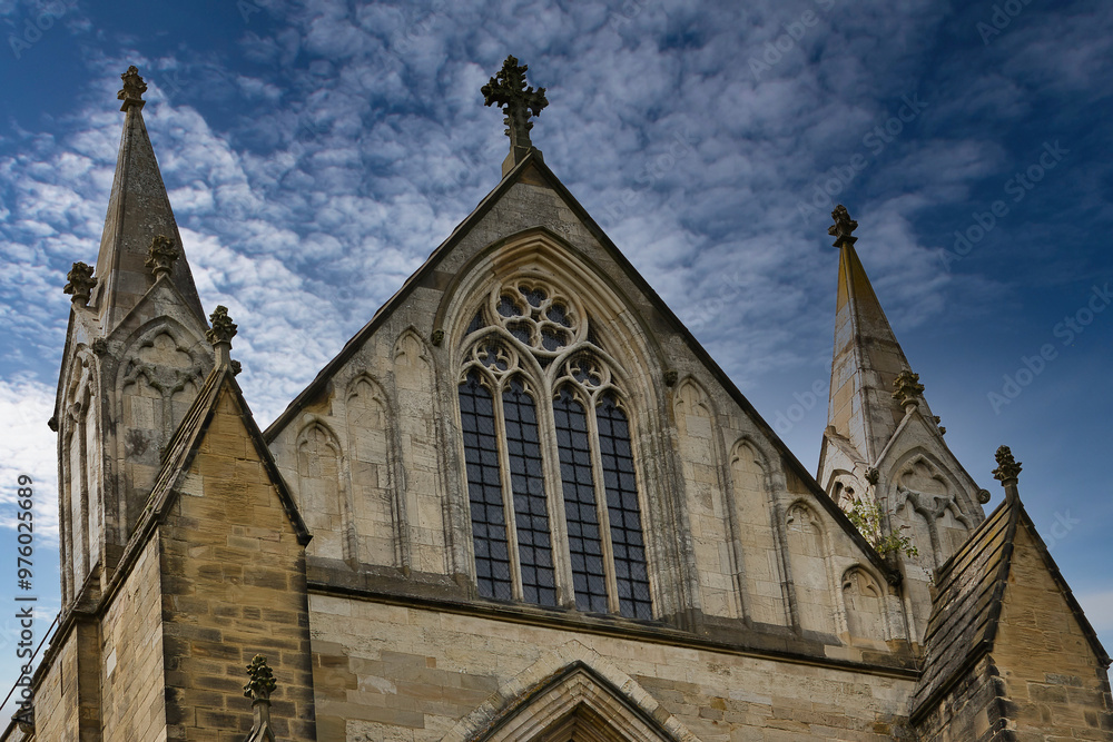 Historic Church with Spires Against Dramatic Sky in Ripon, UK Historic Church with Spires Against Dramatic Sky in Ripon, UK