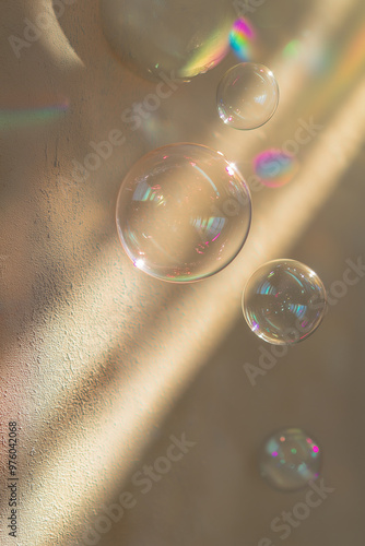 Delicate bubbles float gracefully in the air, reflecting soft light and creating a dreamy atmosphere.