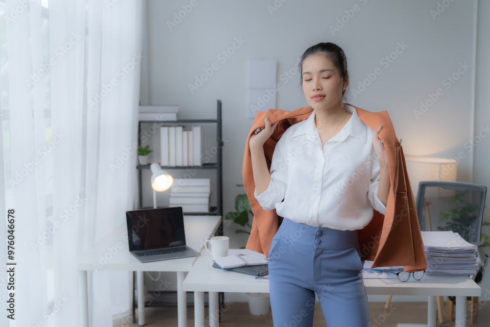 Young businesswoman happily counting money at her office desk, exuding success and joy while managing finances in a room filled with business elements Young businesswoman happily counting money at her office desk, exuding success and joy while managing finances in a room filled with business elements