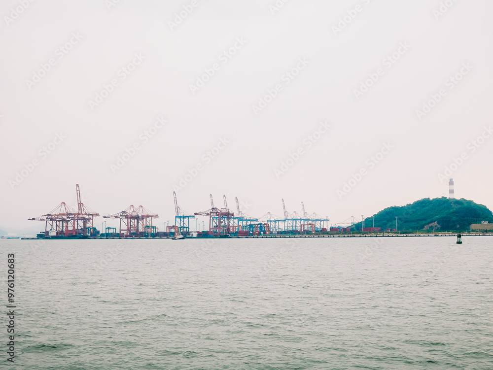 Fototapeta premium Landscape view of Xiamen skyline from the ship,located in Fujian province of China