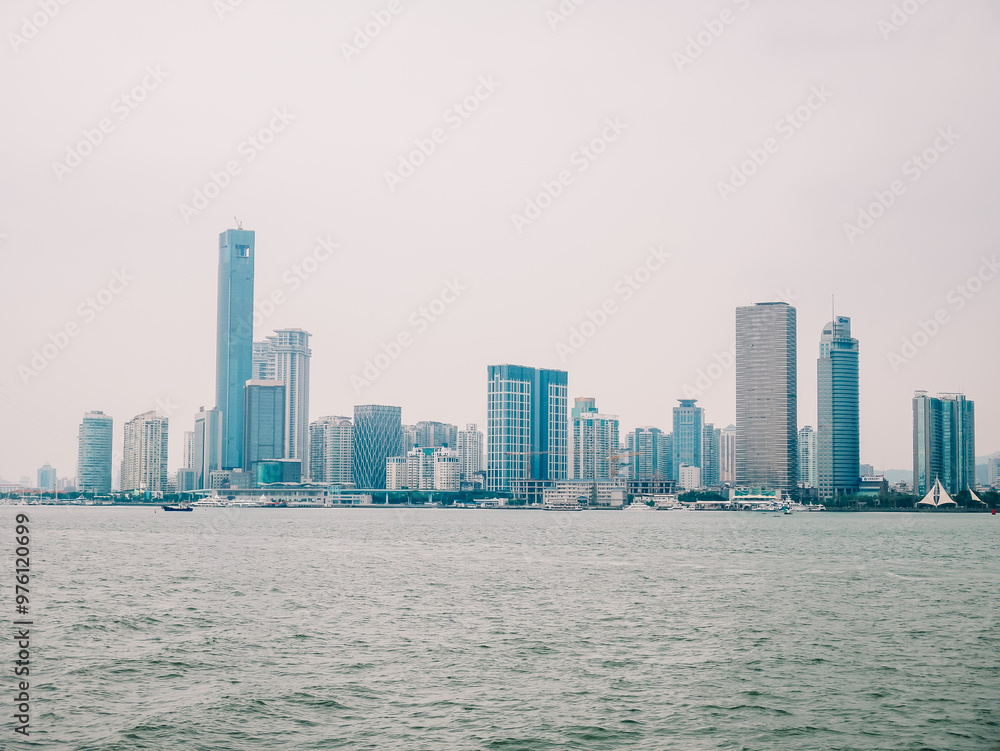 Fototapeta premium Landscape view of Xiamen skyline from the ship,located in Fujian province of China