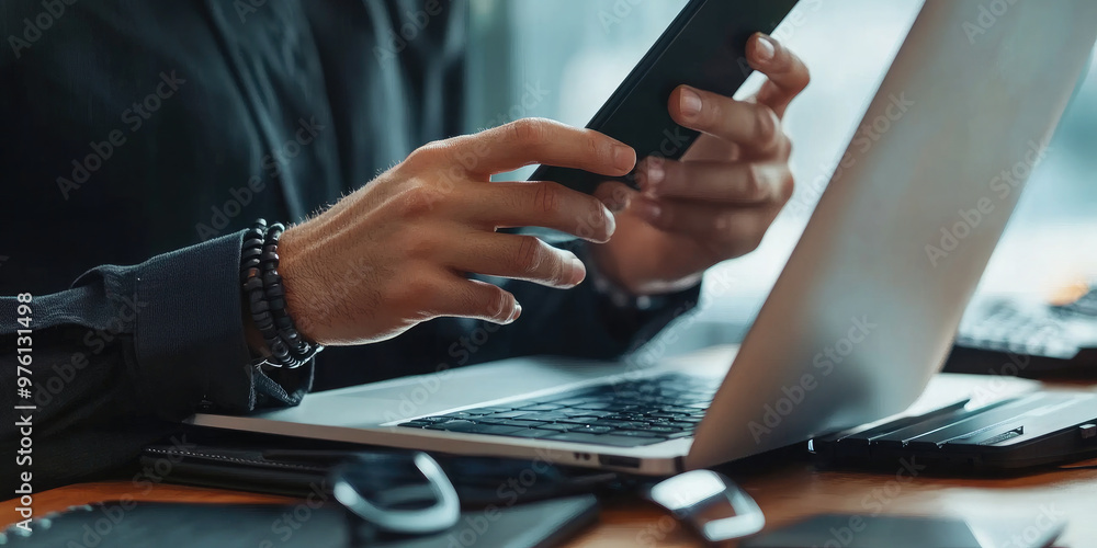 Businessman working with laptop and making phone calls, performing different tasks. Businessman working with laptop and making phone calls, performing different tasks.